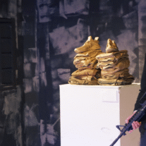 Review: In Absurd ‘Art Duty,’ An Examination of Art, Life, Death and Stuff in Between