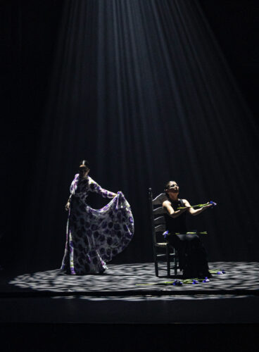 “Vuela” is a work in four acts— “Tierra,” “Mar,” “Muerte” and “Volar.” In the section entitled “Earth,” the dancers pound thefloor with wooden canes in syncopation with the rhythms of their feet. (Photo by Sofia Wittert, courtesy of the Adrienne Arsht Center)