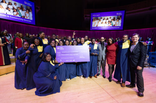 The winners of the 2025 Arsht Gospel Choir Invitational, Gamaliel Fleurantin & Community Sounds, with Arsht President and CEO Johann Zietsman, right. (Photo by Taylor Brown, courtesy of Adrienne Arsht Center)