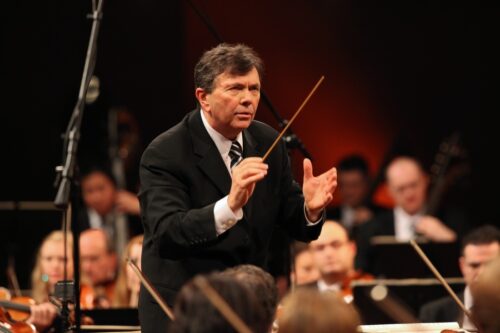 Gerard Schwarz conducts the Frost Symphony Orchestra, a 100- member ensemble of University of Miami students (Photo by Steven J. Sherman courtesy of the Arsht Center).