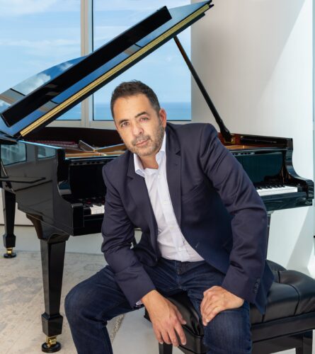 Jorge Mejia, composer and pianist who has lived in Miami for more than 40 years, will perform his concerto “If These Walls Could Talk” with the Frost Symphony Orchestra at the Adrienne Arsht Center. (Photo by Laura Coppelman, courtesy of Arsht Center).