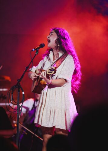 A multi-instrumentalist, Estrada often plays a Venezuelan cuatro that was built by her father. She grew upin Coatepec, Mexico, where both of her parents are musicians and luthiers. (Photo by OS Photo Studio)